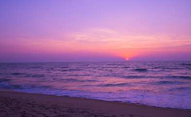 beautiful moody sunset with sea in the foreground