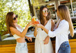 © BGStock72 - Three pretty young women drinking coctais in beach bar