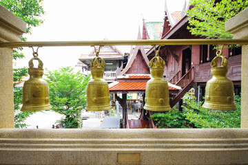 Wall Mural - Gold Bells hanging in the Temple in Thailand