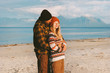 Hugging couple on beach traveling together man and woman family lifestyle concept romantic vacations outdoor