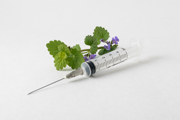 Wall Mural - medical syringe with a long needle for the treatment of diseases and beauty shots on a white background