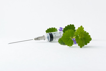 Wall Mural - medical syringe with a long needle for the treatment of diseases and beauty shots on a white background