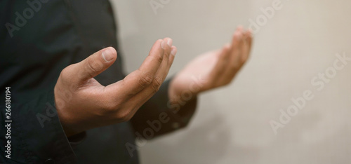 Fotomural close up adult muslim prayer man hand praying at mosque concept