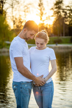 Happy Couple Expecting Baby, Pregnant Woman With Husband, Young Family And New Life Concept