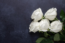 White Rose Flowers Bouquet On Black Stone Background