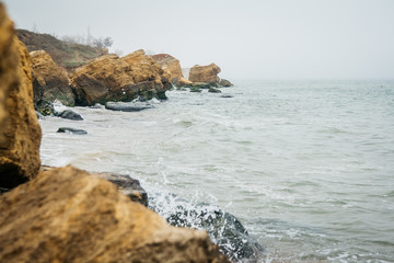 Wall Mural - Beautiful wild Beach Fontanka near Odessa. Yellow and red sandstone cliffs are located on the seafront