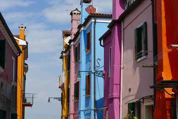 tourist in coloured italian house