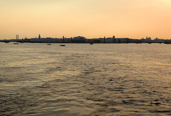 Canvas Print - View of the Neva river and Vasilievsky island at sunset.