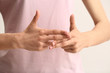 © Pixel-Shot - Woman showing word NAME, closeup