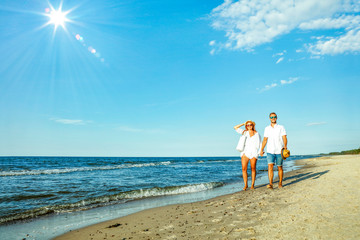 Wall Mural - Young people on beach and free space for your decoration. 