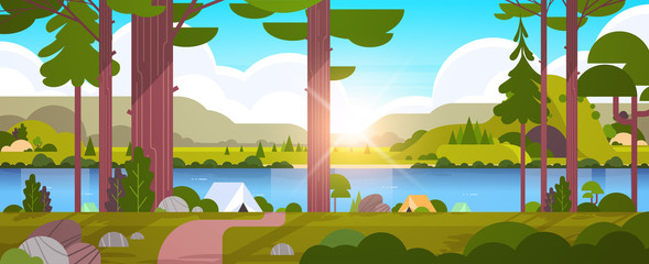 tents camping area in forest summer camp concept sunny day sunrise landscape nature background with 