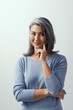 © Svyatoslav Lypynskyy - Asian woman smiling and pointing her finger to her cheek