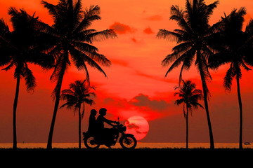 Wall Mural - silhouette of lover couple in sunset with classic motorcycle