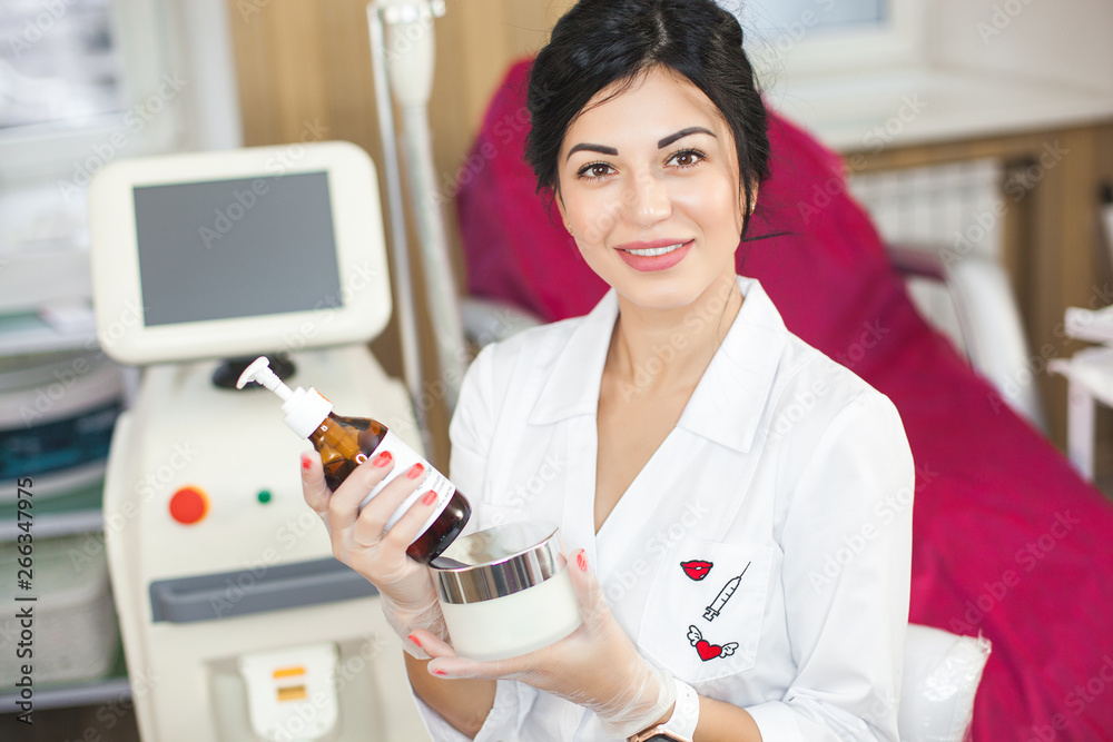 Yoyng beautiful doctor with copy space. Attractive dermatologist ...