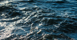 Fototapeta Konie - Waves at the seashore. Selective focus with shallow depth of field.