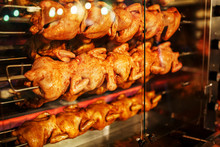 A Stack Of Grilled Chicken On A Skewer Fried In A Commercial Oven