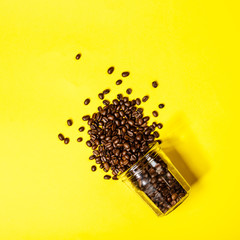 Poster - Coffee beans on yellow background, flat lay, top view