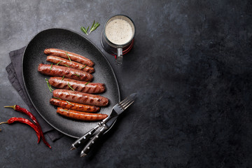 Wall Mural - Grilled sausages and beer