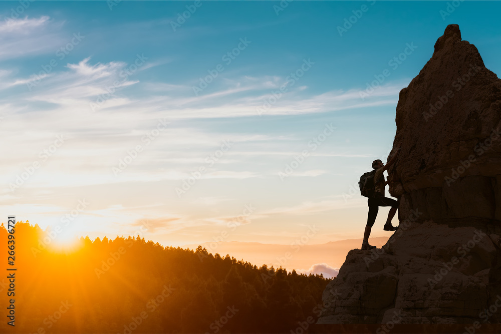 silhouette of successful climbing woman in mountains Concept of concept of motion motivation inspiration at beautiful sunset - obrazy, fototapety, plakaty 