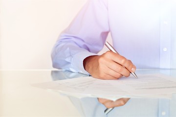 Wall Mural - Businessman is signing a contract, business contract details