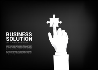 Poster - close up businessman hand touch jigsaw piece. business concept of solution and matching.