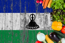 Fresh Vegetables From Lesotho On Table. Cooking Concept On Wooden Flag Background.