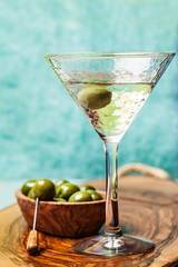 Wall Mural - Martini cocktail with green olive