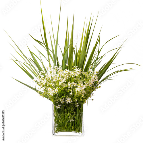 flower bouquet in a glass vase isolated on white background