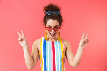 Canvas Print - Happy pretty redhead woman in dress and sunglasses