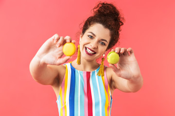 Sticker - Happy pretty redhead woman wearing in dress showing sweets