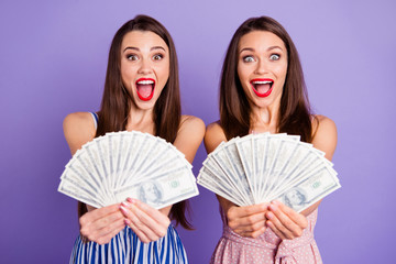 Sticker - Close up photo two people beautiful she her models ladies raise money hands arms hold buy buyer pay payment fan usa bucks yell wealthy wear colorful dresses isolated purple violet background