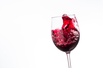 wine splashes in glasses isolated on white background