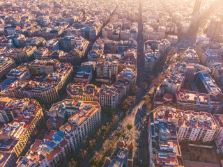 Aerial view of Barcelona Eixample residencial district, Sagrada familia, typical urban squares, Spain.2019