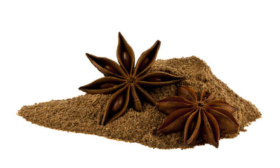 Poster - Pile of cinnamon and anise stars isolated on white background.