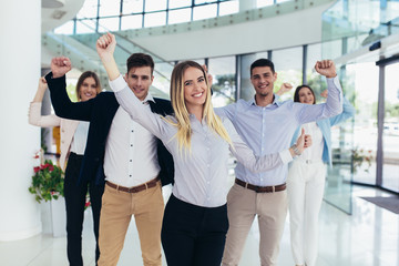 Group of happy business people and company staff in modern office, representig company