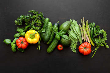 Wall Mural - Dark culinary background with fresh produce