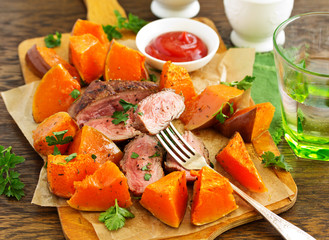 Canvas Print - Roast beef with baked pumpkin.