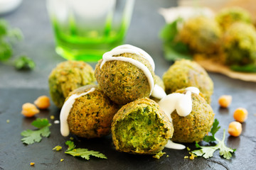 Wall Mural - Fresh falafel balls on a dark background.