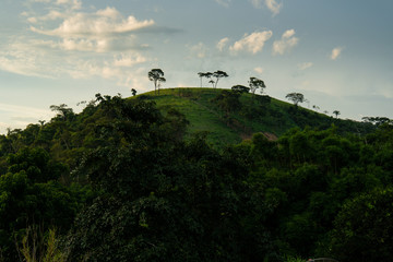 Wall Mural - Hill, sky and clouds