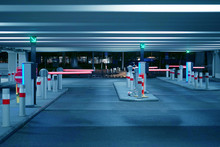 Barrier At Entrance And Exit Of A Car Parking Garage. Barrier In A Car Park. Exit From Underground Parking. Underground Parking/garage. Interior Of Parking. Toning