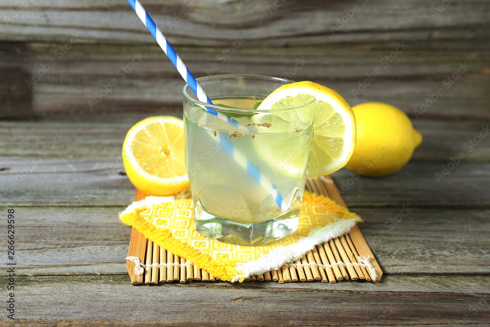 fresh lemon lime citrus fruit lemoned or lemon juice in wooden 