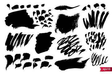 Poster - Set of hand drawn scribble spots isolated on white. Doodle style sketches. Monochrome vector design elements.
