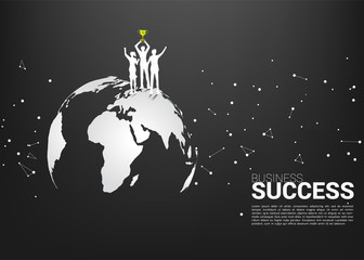 Poster - Silhouette of businessman and businesswoman with champion trophy standing on world map. Business Concept of international award winner.