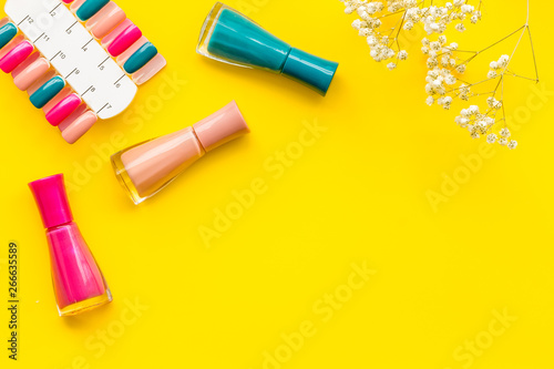 Fotomural cosmetics for manicure with nail polish and palette for spring design in nail ba