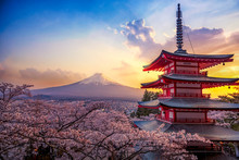 Fujiyoshida, Japan Beautiful View Of Mountain Fuji And Chureito Pagoda At Sunset, Japan In The Spring With Cherry Blossoms