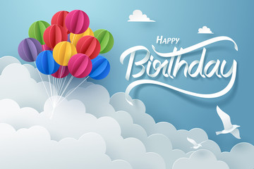 Paper art of happy birthday calligraphy hand lettering with colorful balloon