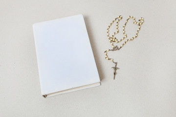 Wall Mural - Holy Bible and white rosary.