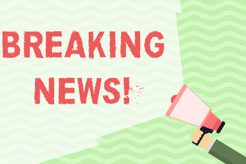 Poster - Conceptual hand writing showing Breaking News. Concept meaning Newly received info about an event and currently occurring Hand Holding Megaphone with Wide Beam Extending the Volume