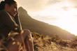 © Jacob Lund - Female tourist taking a rest after a country walk