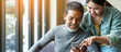© ChayTee - Smile attractive stylish short beard mature asian man using smartphone with young woman. Daughter teach asian old man or dad using internet social media network technology with digital gadget at home.
